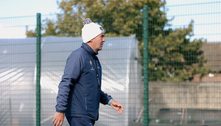 Marc Kenny walking on the training ground