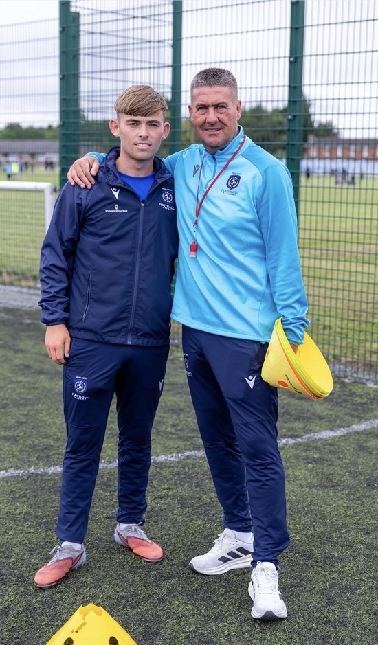 Marc Kenny with a player