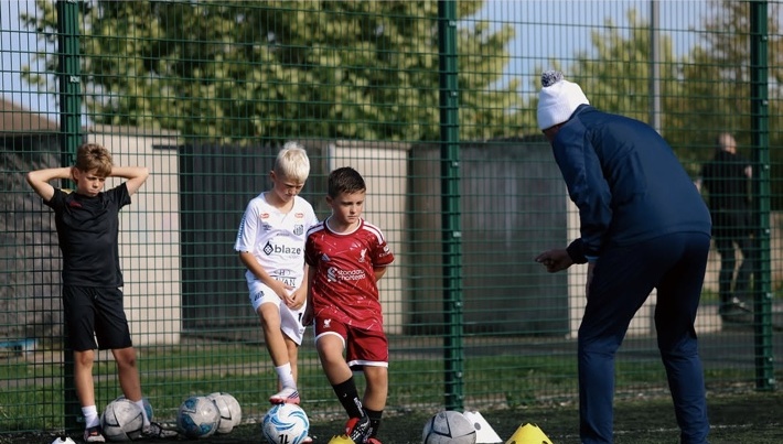 Young players in a dribbling exercise