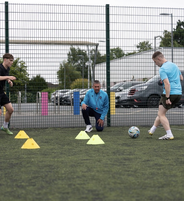 Marc Kenny watching players in a small-sided drill