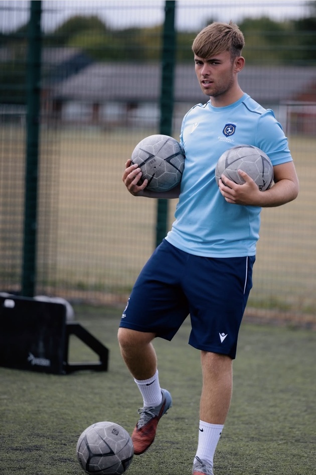 Player juggling footballs during training